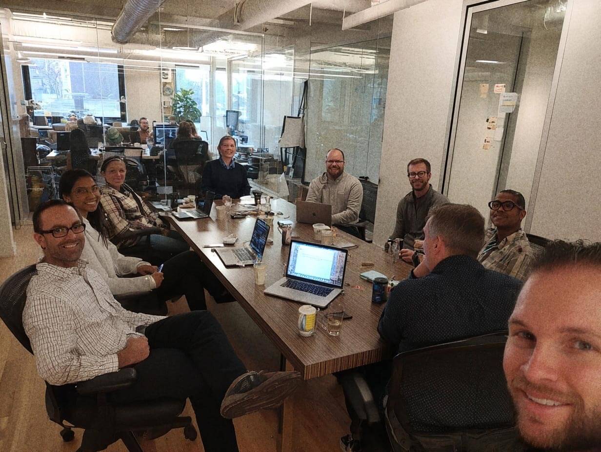 Fluency Digital team collaborating on innovative solutions